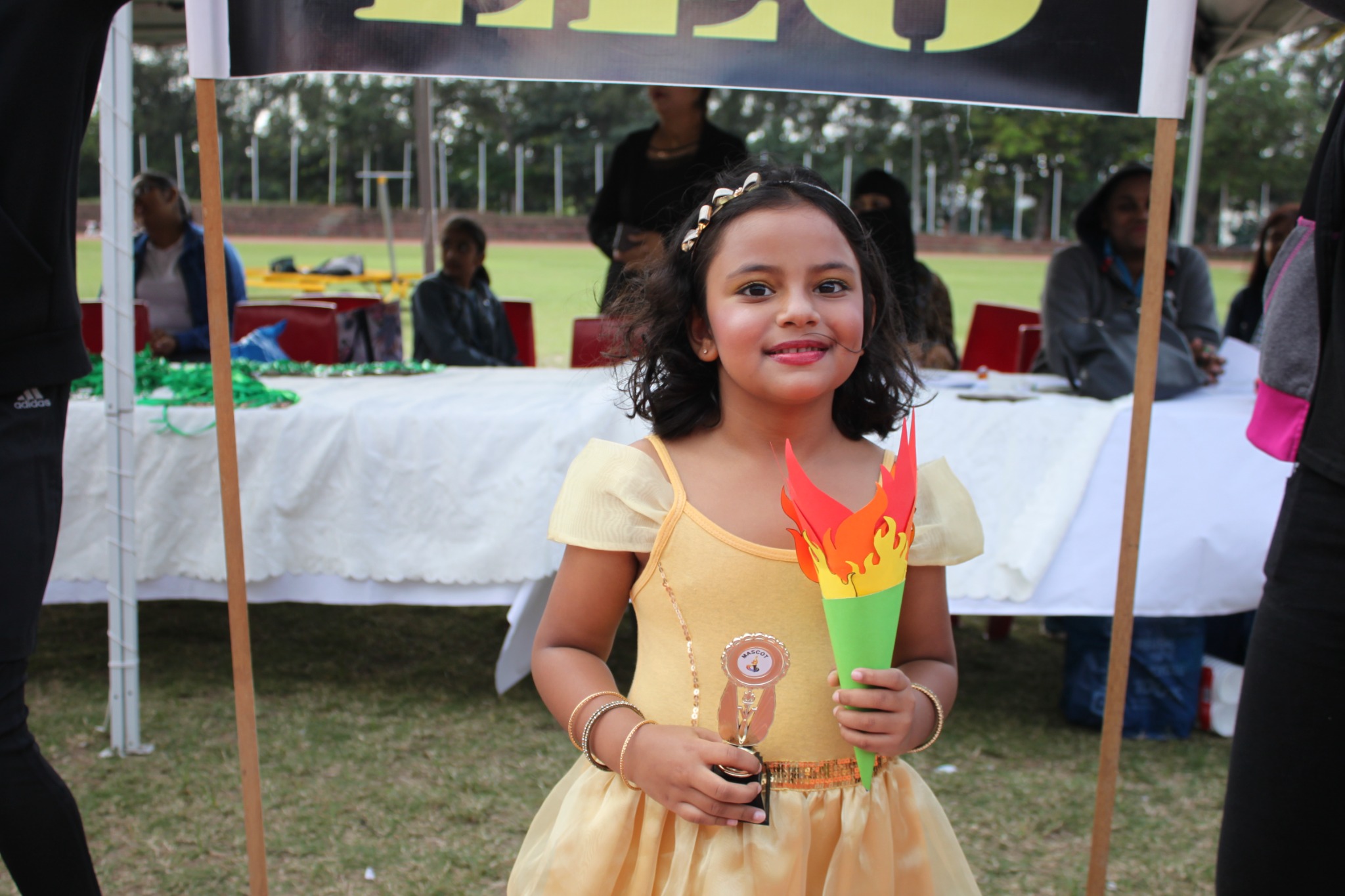 MEPS learner receiving recognition at a school event
