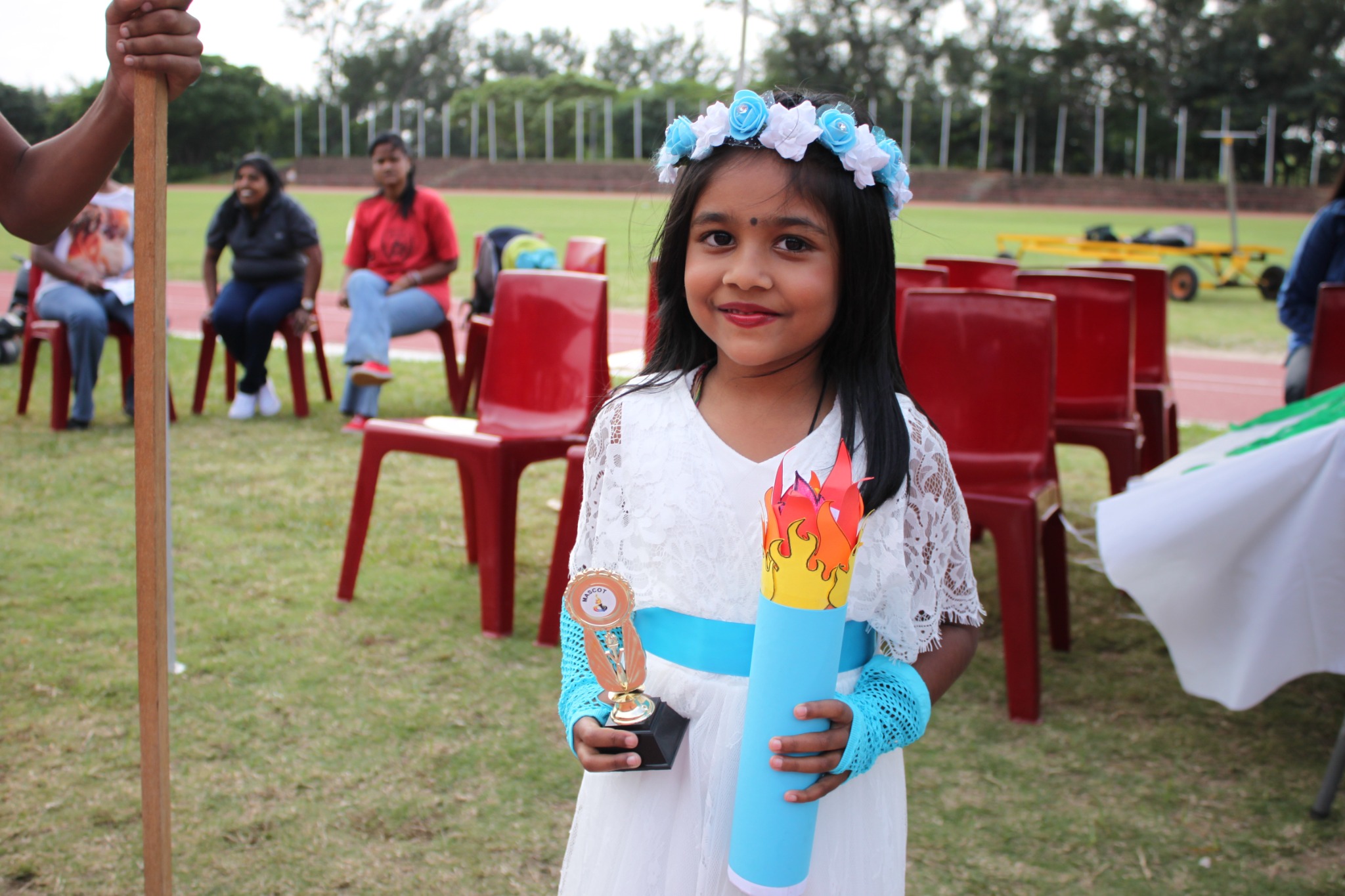 MEPS learner with award at a school event