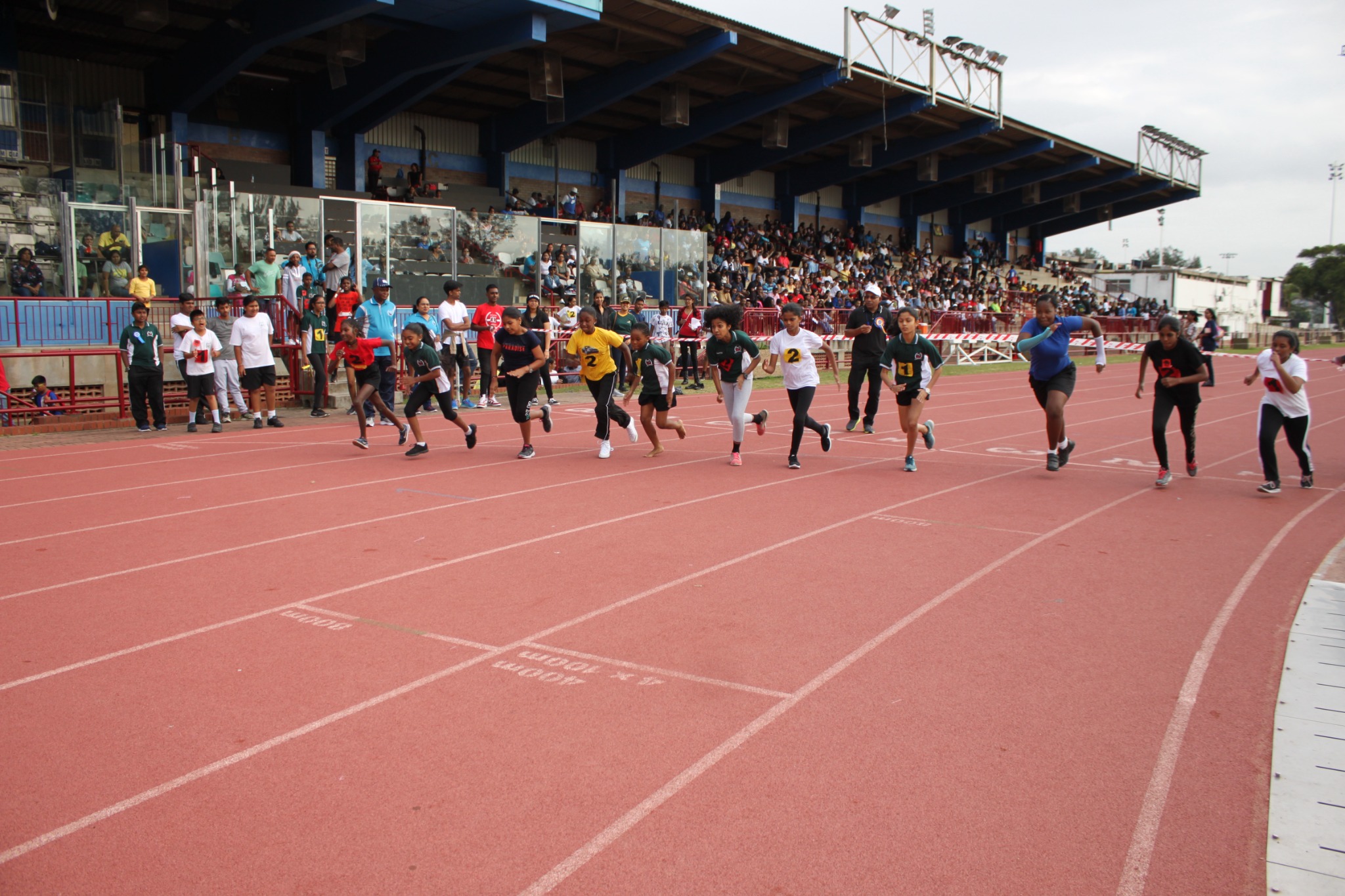 MEPS learners racing on the athletics track